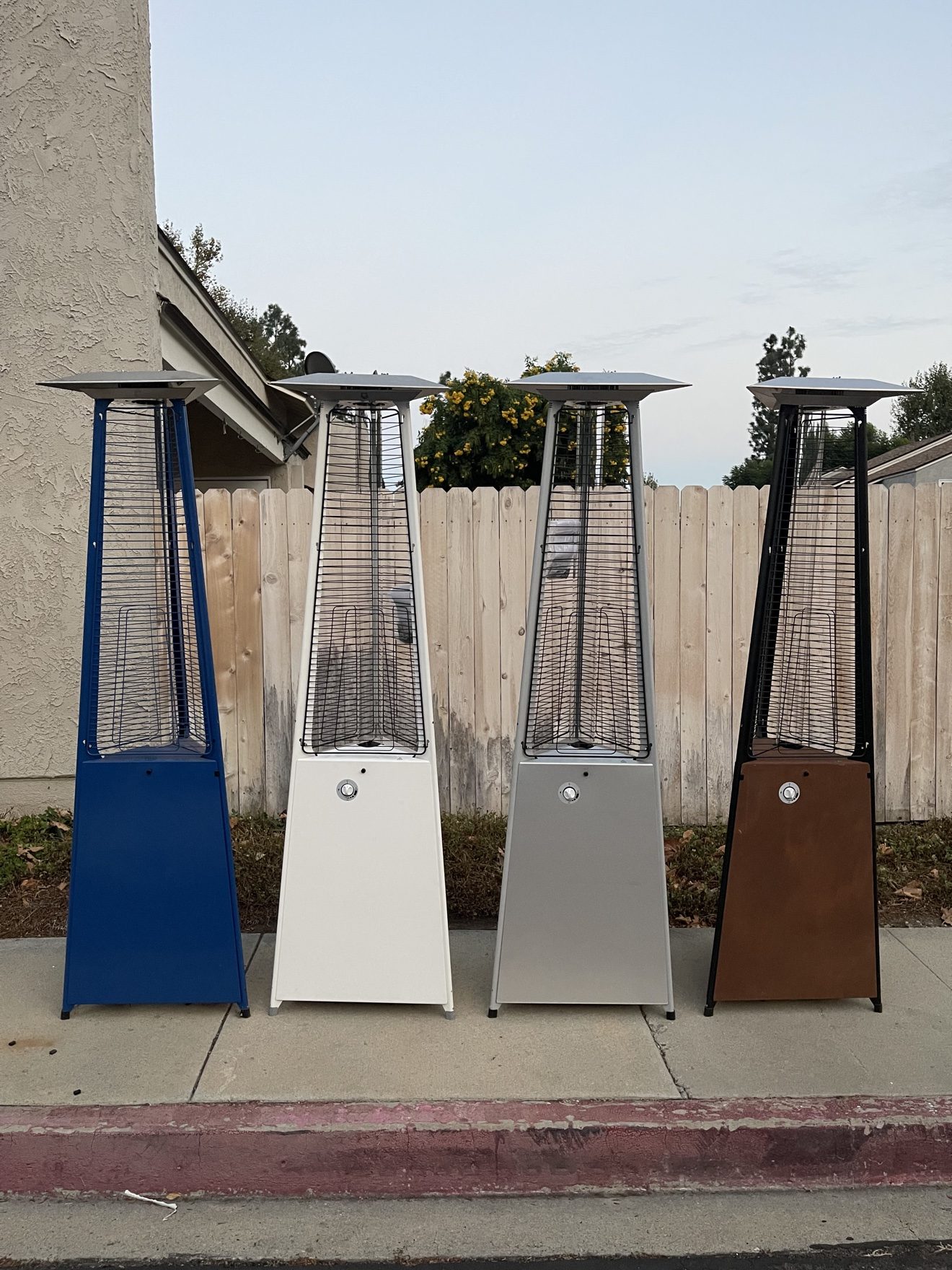 Italkero Falo Evo pyramid patio heaters in four finishes